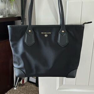 Black Michael Kors over the shoulder purse